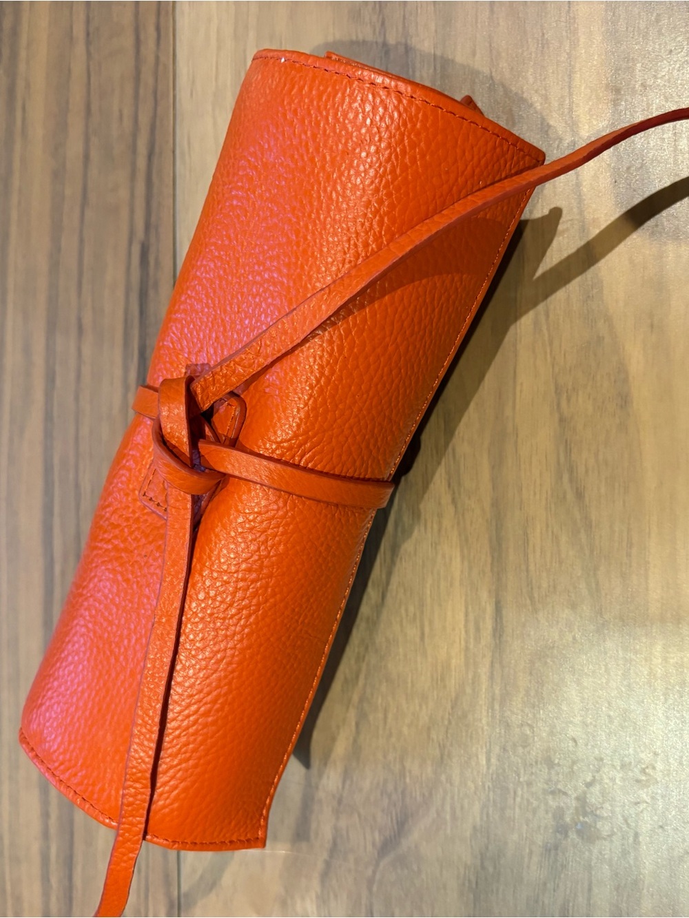 Orange Leather Roll-Up Jewelry Pouch